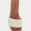 Krämfärgade Ralph Lauren Andela sandaler i kalvmocka för kvinnor Krämfärgade Ralph Lauren Andela sandaler i kalvmocka för kvinnor