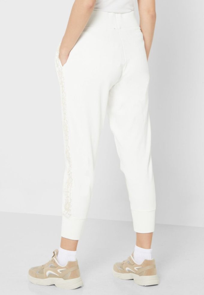 Vita Ralph Lauren stickade byxor med hög midja för kvinnor Vita Ralph Lauren stickade byxor med hög midja för kvinnor